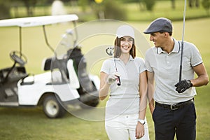 Young couple at golf course