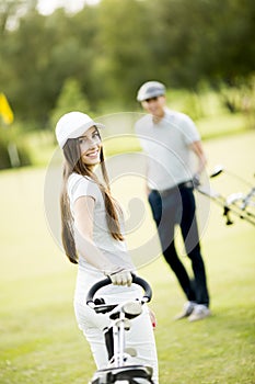 Young couple at golf course