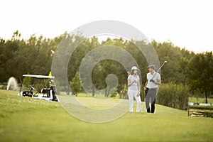 Young couple at golf course