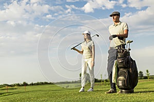 Young couple at golf court