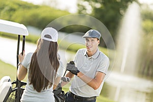 Young couple at golf court