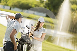 Young couple at golf court