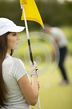 Young couple at golf court