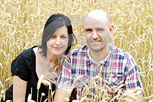 Young couple in a grain field