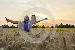 Young couple at grain field