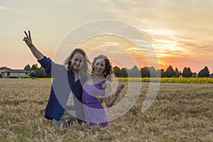 Young couple at grain field