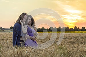 Young couple at grain field