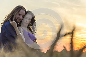 Young couple at grain field