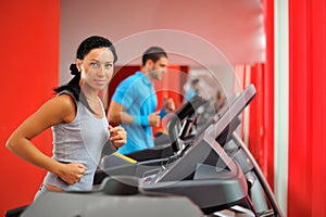 Young couple in the gym