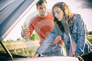 A young couple had a car breakdown on the road