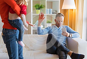 Young couple having difficulties at parenting together