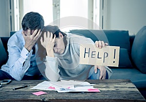 Young Couple having financial problems feeling stressed paying bills debts mortgage asking for help