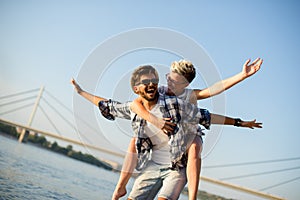 Young couple having fun at the beach