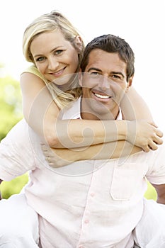 Young couple having fun in countryside