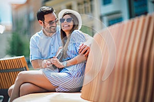 Young couple having fun and laughing together outdoors