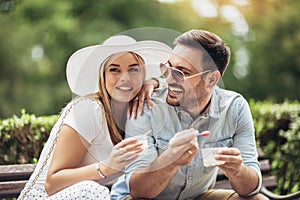 Young couple having fun and laughing together outdoors