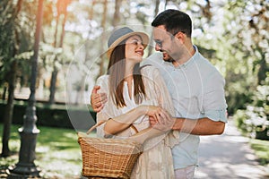 Young couple having fun and laughing together outdoors