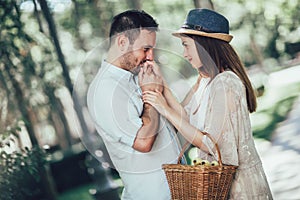 Young couple having fun and laughing together outdoors