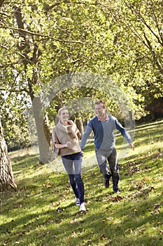 Young couple having fun in park