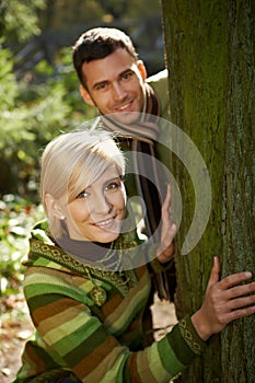 Young couple having fun in park