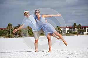 Young couple having fun at tropical beach