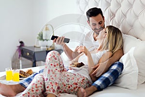 Young couple having having romantic times in bedroom