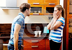 Young couple having quarrel in the kitchen