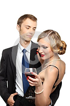 YOUNG COUPLE HAVING RED WINE