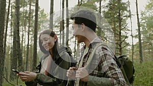 Young couple hiking in a forest