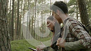 Young couple hiking in a forest