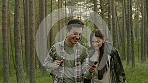 Young couple hiking in a forest