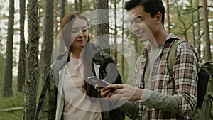 Young couple hiking in a forest