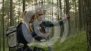 Young couple hiking in a forest