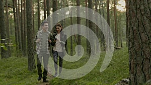 Young couple hiking in a forest