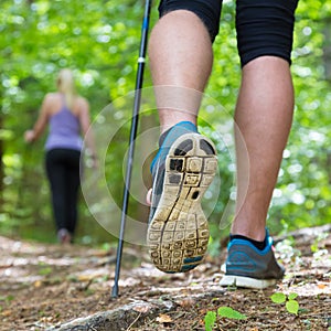 Young couple hiking in nature. Sport and exercise.