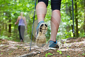 Young couple hiking in nature. Sport and exercise.