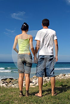 Young couple holding hands