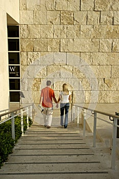 Young couple holding hands