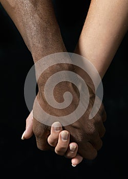 Young couple holding hands photo