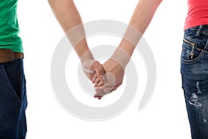 Young couple holding hands on white Background