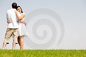 Young couple hug