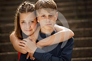 Young couple hugging on a romantic date in summer