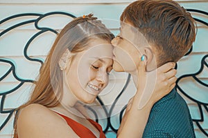 Young couple hugging on a romantic date in summer