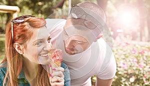 Young couple with ice cream. reflected light effect