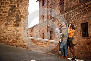 Young couple at the Italy.Happy tourists travelling and enjoying on vacation