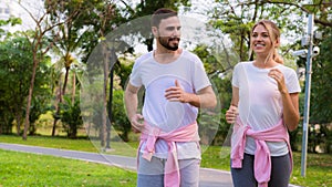 Young couple jogging, running and excercise in the park