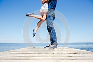 Young couple kissing on the beach