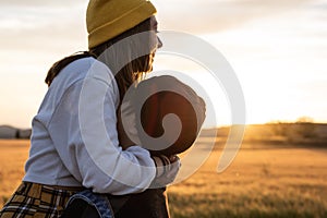 Young couple kissing and hugging at sunset .Millennial happy people concept