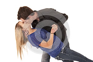 Young couple kissing leaning backwards