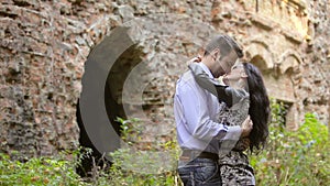 Young couple kissing on nature